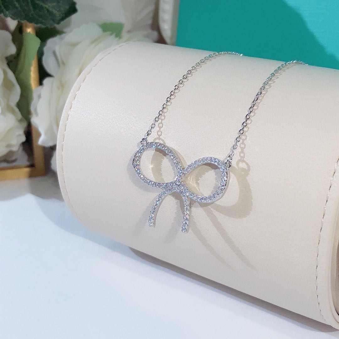 [Reverie Jewels]CLAW SET RHODIUM PLATED BOW NECKLACE