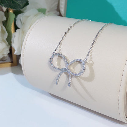 [Reverie Jewels]CLAW SET RHODIUM PLATED BOW NECKLACE