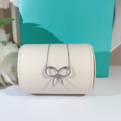 [Reverie Jewels]CLAW SET RHODIUM PLATED BOW NECKLACE