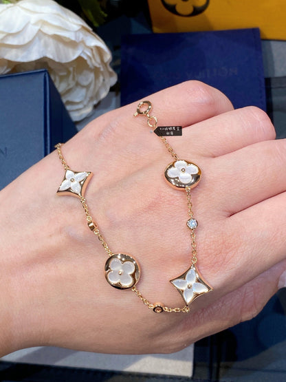 [⭐Reverie Jewels]STAR AND SUN 4 MOTIF WHITE MOP PINK GOLD BRACELET